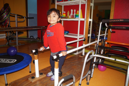 Child in rehabilitation session at Angelitos de Cristal